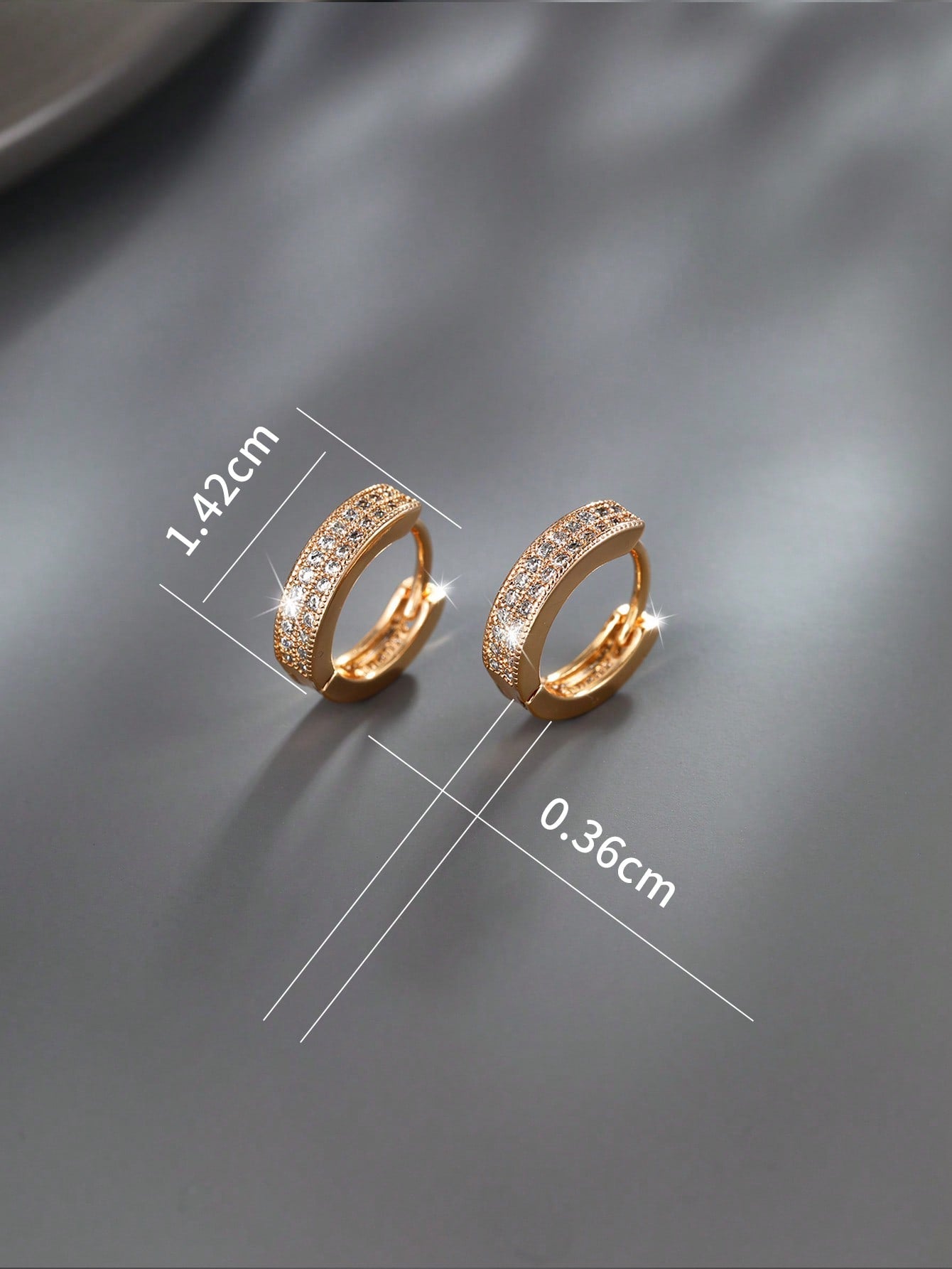 GZ Ice presents elegantly crafted cubic zirconia earrings with your choice of delicately colored and placed stones.