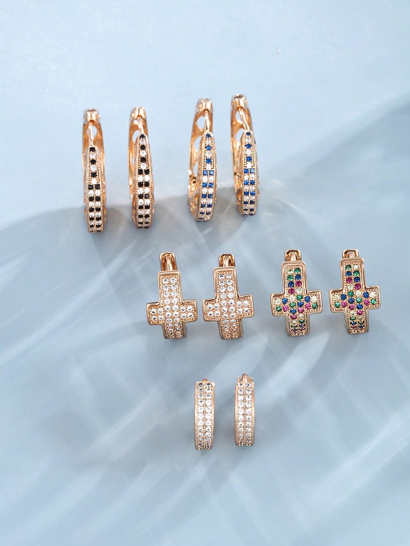 GZ Ice presents elegantly crafted cubic zirconia earrings with your choice of delicately colored and placed stones.